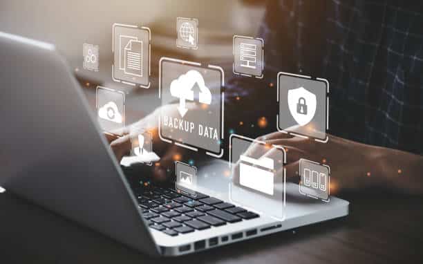 backups Businessman using a computer to backup storage data Internet technology concept for backup online documentation database and digital file storage system or software,file access, doc sharing.